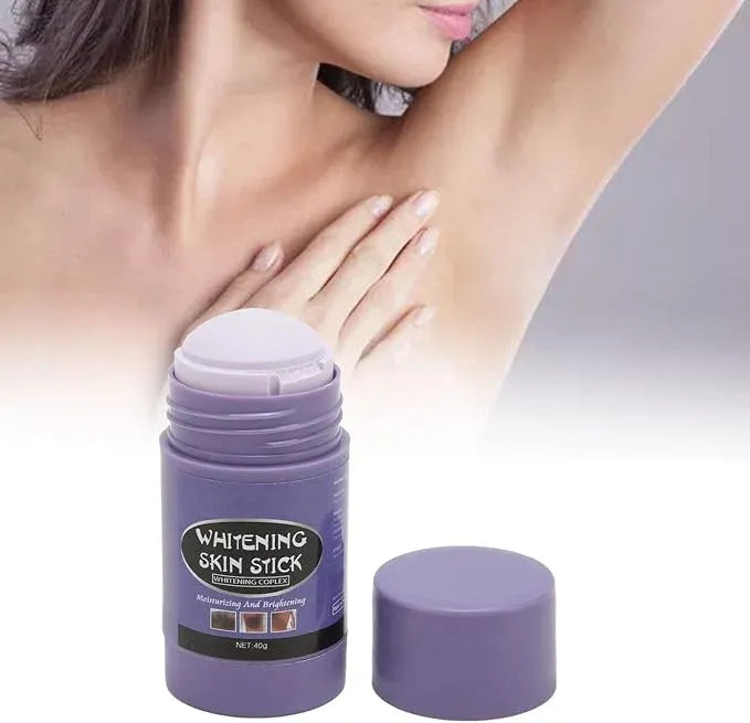 Applying skincare to underarm